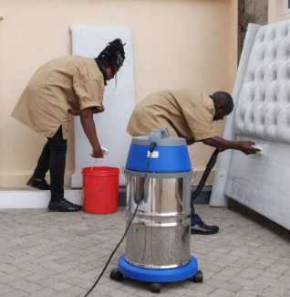 G&D Cleaning team preparing a room